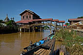 Inle Lake Myanmar. All the buildings are constructed on piles. Residents travel around by canoe, but there are also bamboo walkways and bridges over the canals, monasteries and stupas. 